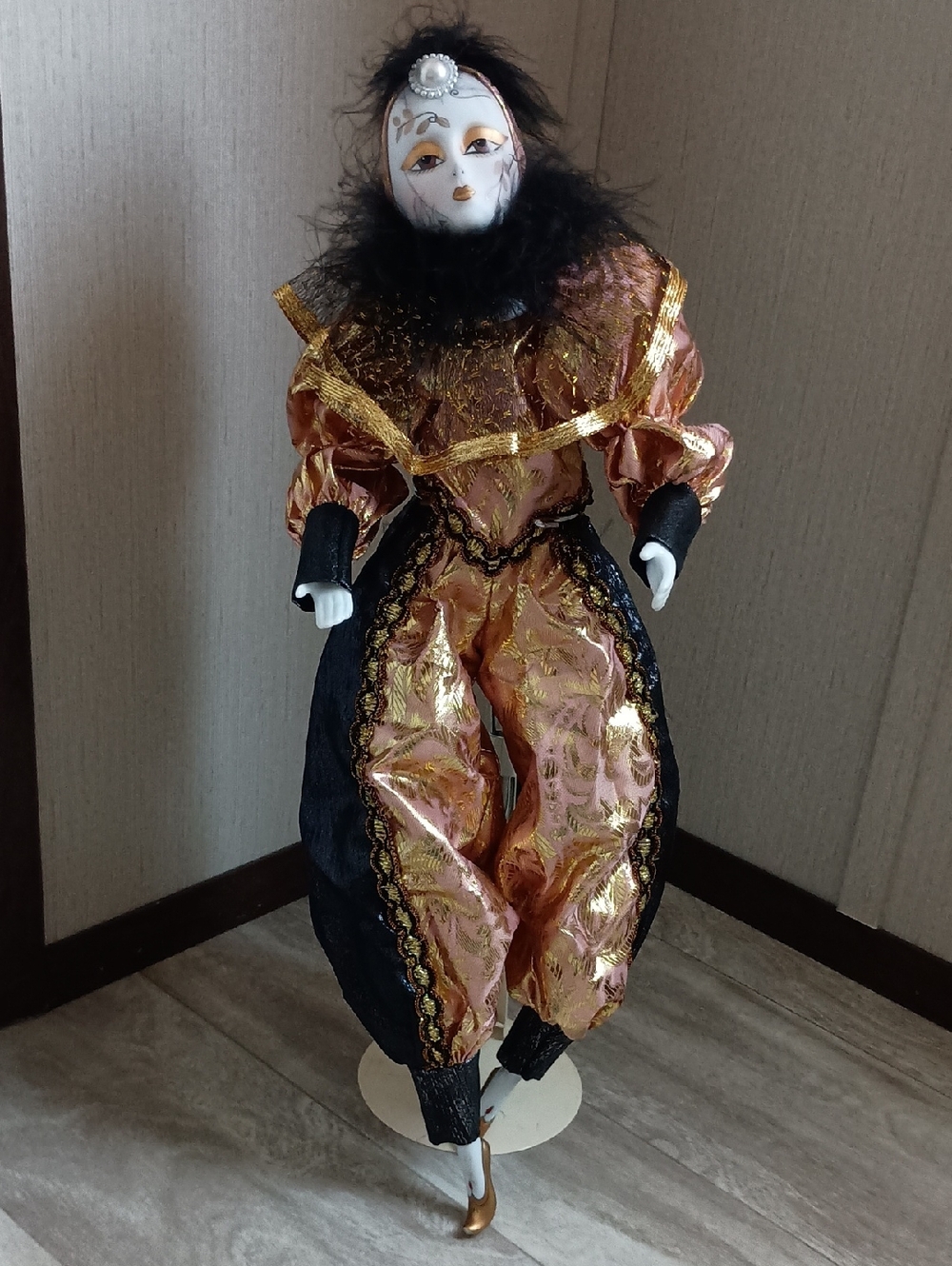 Porcelain Clown Doll in Gold and Black With Music Box